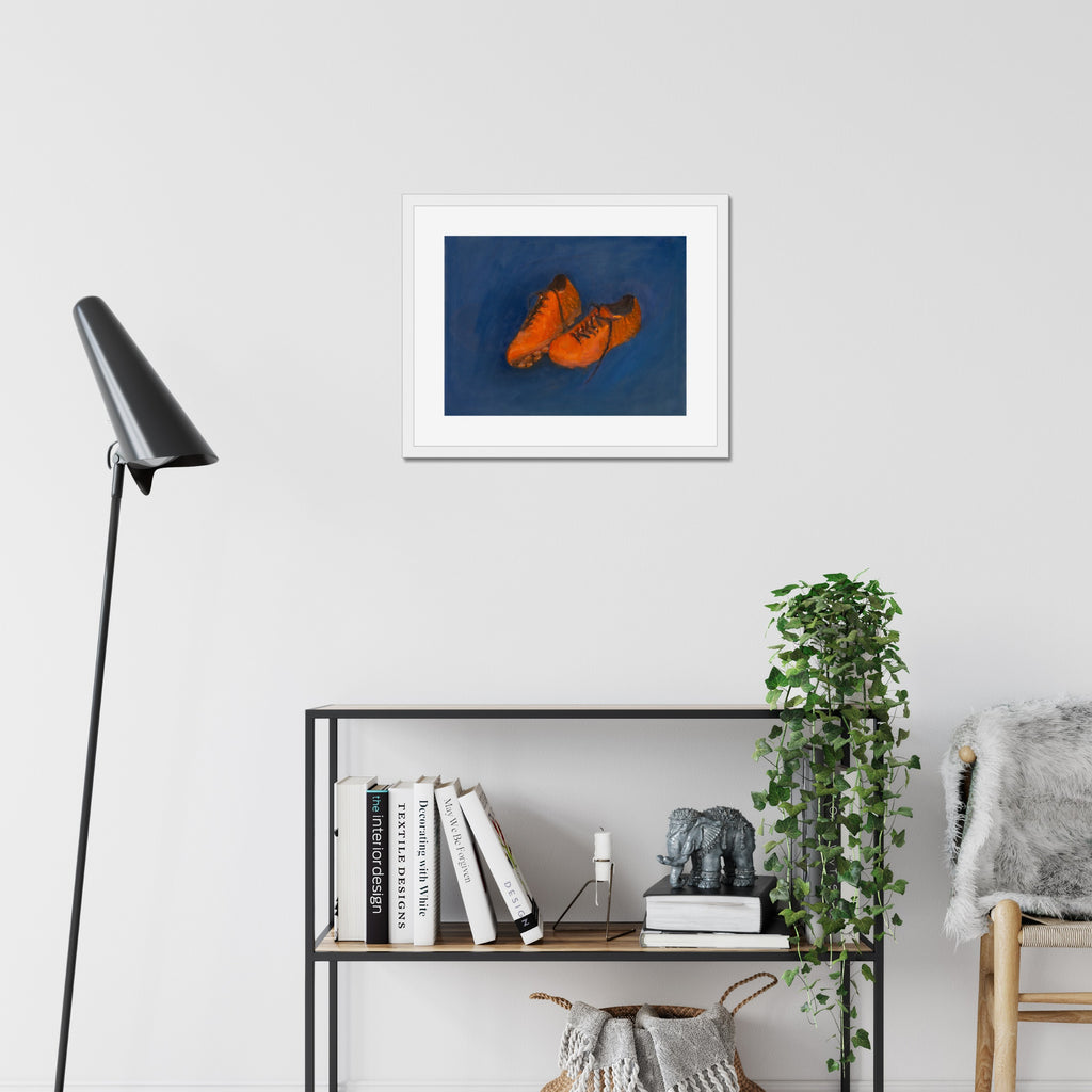 Soccer Shoes art print, 16x20, in a white frame with white mat, hanging on a wall